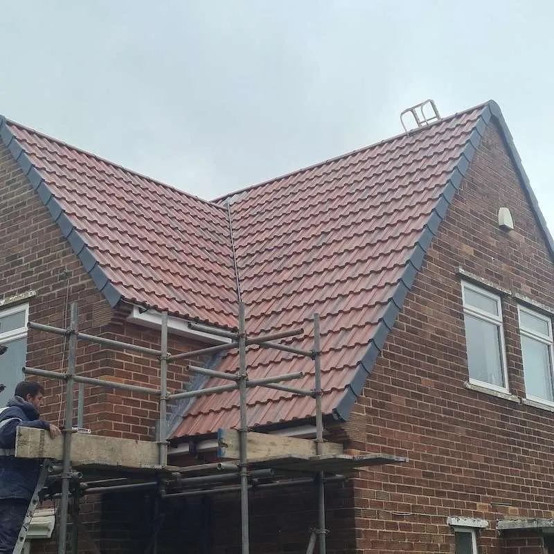 Roofstone Roofing Specialist working on a residential roof